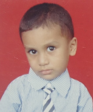 A young boy supported by SWA's education programme