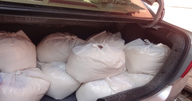 Ration bags packed for a verified family